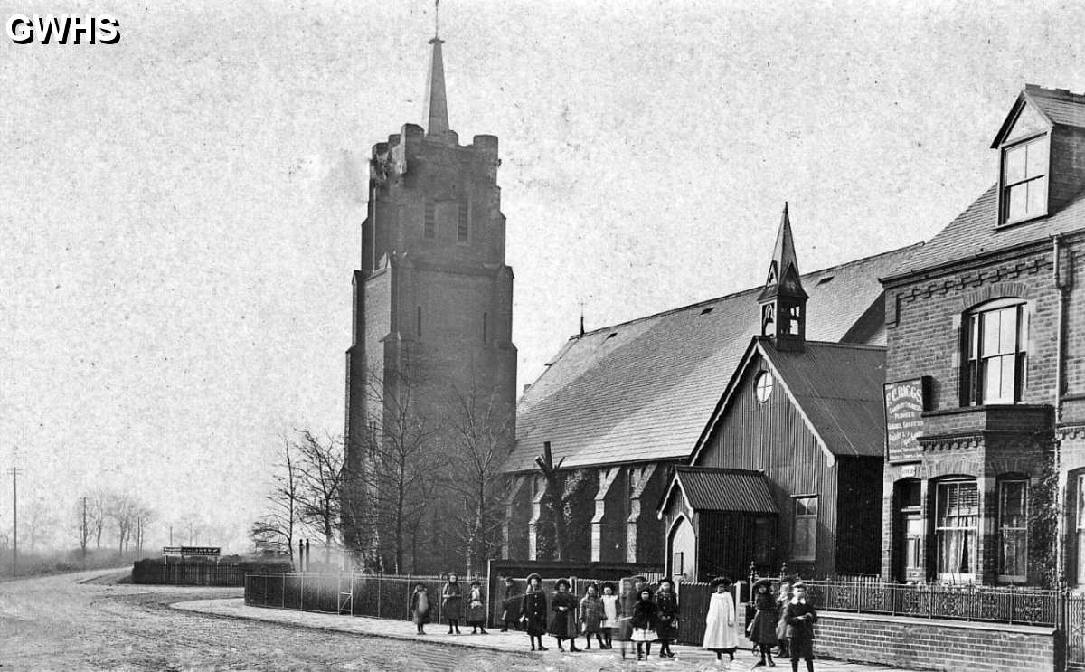 30-726 St Thomas church with the original Tin Tabernacle that was used before the church was built