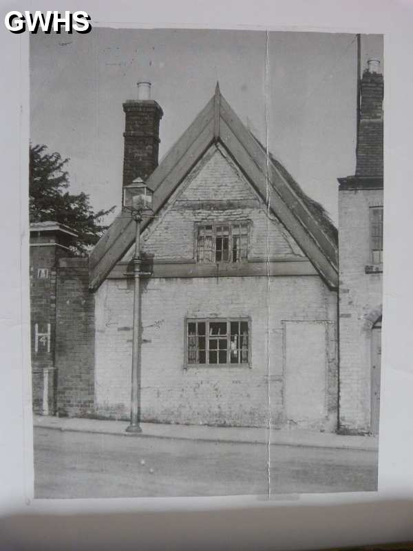 23-058 Part of the St Woostans Farm Building on Bull Head Street - onleft is the pillar of St Woolstans House