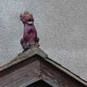 19-434 Gargoyl on house roof in Bull Head Street Wigston Magna May 2012