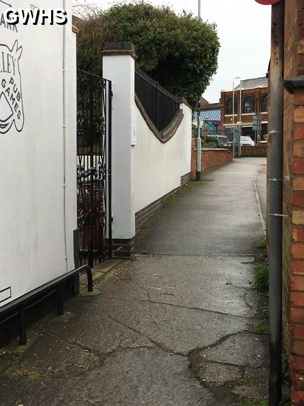 39-355 Sign on wall in the alley way outside the Horse & Trumpet Pub on Bull Head Street 2021