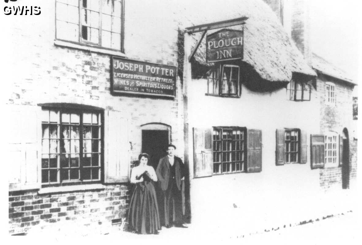 23-014 Plough Inn Bushloe End - Joseph Potter in doorway 