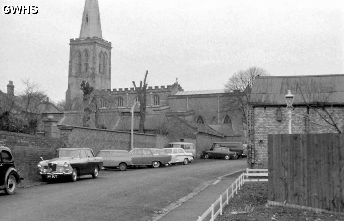 30-766 All Saints' church showing the outbuildings for Rectory Farm 1963