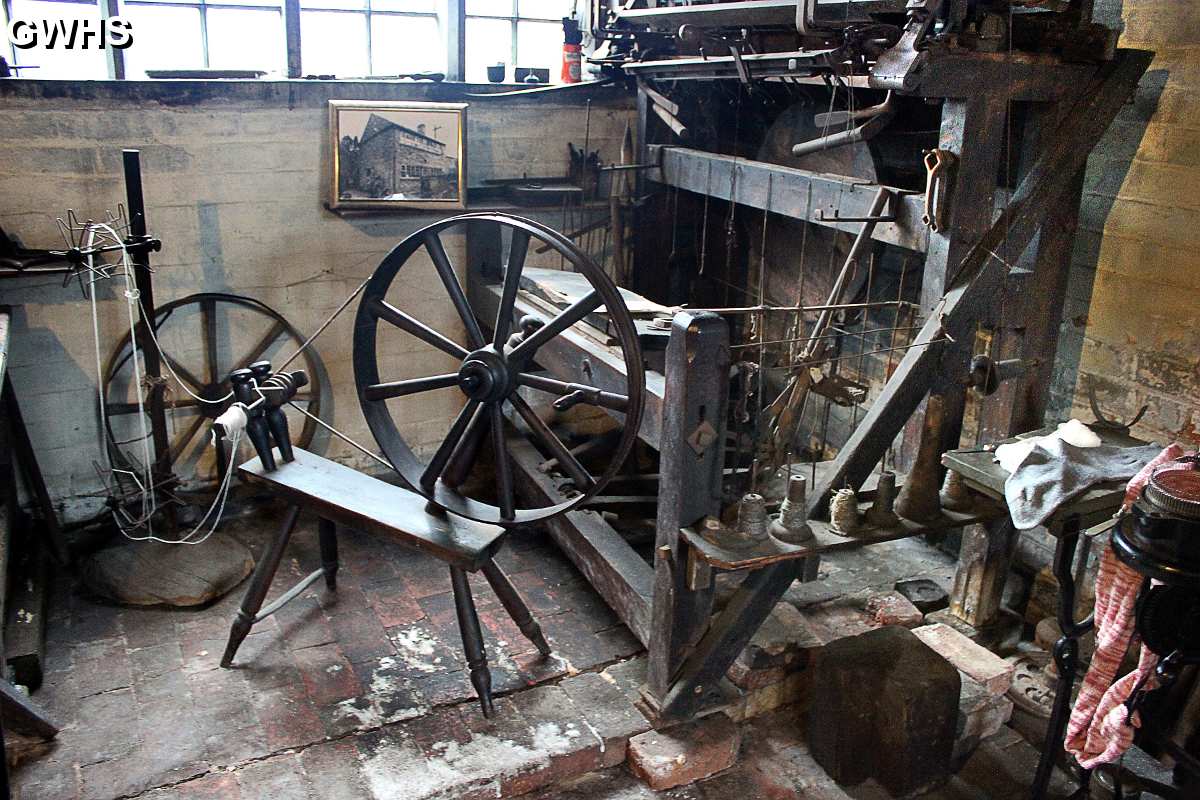 34-894 One of the frames in the workshop with a spinning wheel The Framework Knitters Museum 42 – 44 Bushloe End, Wigston Magna