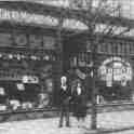 22-127 Charles Moore and Kathleen Veasey circa 1929 outside Chas Moore Music Shop on corner of Blaby Road and Canal Street 