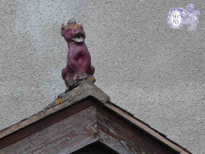 19-434 Gargoyl on house roof in Bull Head Street Wigston Magna May 2012