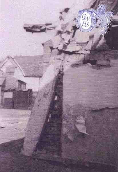23-691 Demolition of Cruck Cottages with Quaker Cottage in the background Bull Head Street Wigston Magna