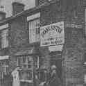 22-411 Frank Fosters shop just prior to demolition for road widening  circa 1964