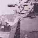 23-691 Demolition of Cruck Cottages with Quaker Cottage in the background Bull Head Street Wigston Magna