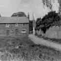 30-581 Cottage on Bull Head Street with original mud wall