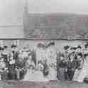 8-72 Butcher Johnsons fathers wedding outside old cottages on Bull Head Street Wigston Magna