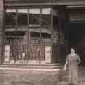 29-113 Shop of Charles H Hold 18 Bushloe End Wigston Magna with Emma Holt nee Bates in shop doorway c 1940