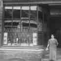 29-113a Shop of Charles H Hold 18 Bushloe End Wigston Magna with Emma Holt nee Bates in shop doorway c 1940