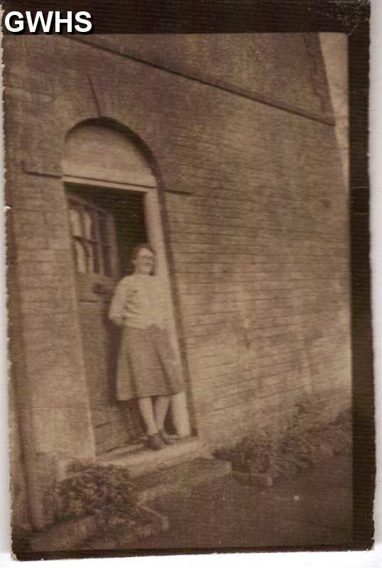 25-106 Annie Russell nee Bolton standing on the Front Door Step of 23 Cedar Ave Wigston