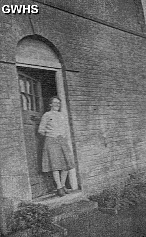 25-106a Annie Russell nee Bolton standing on the Front Door Step of 23 Cedar Ave Wigston