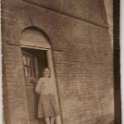 25-106 Annie Russell nee Bolton standing on the Front Door Step of 23 Cedar Ave Wigston
