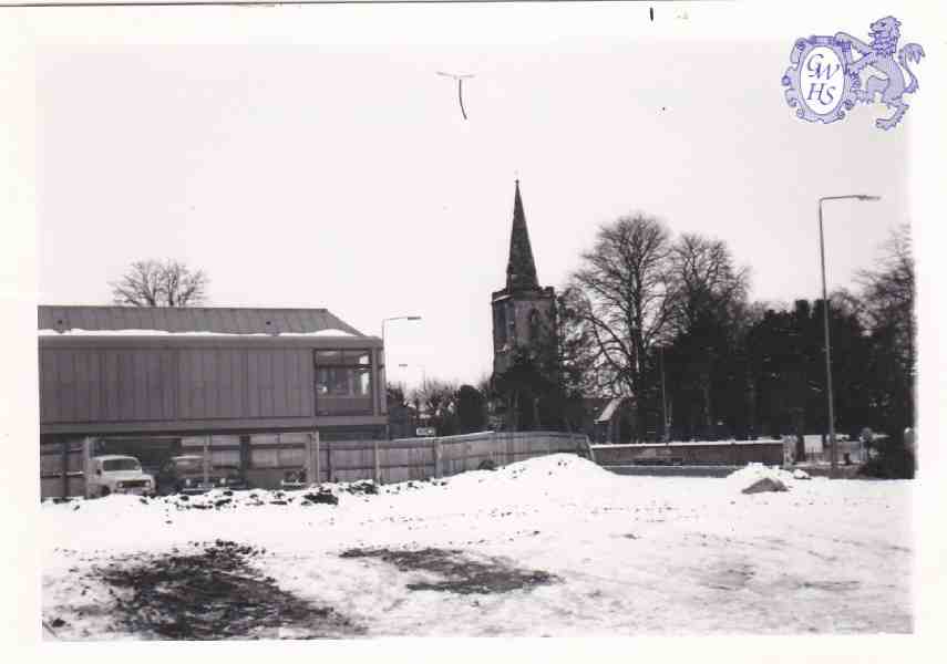 8-265 View of St Wolstans and Library Bull Head Street Wigston Magna from vacant C00o shop site