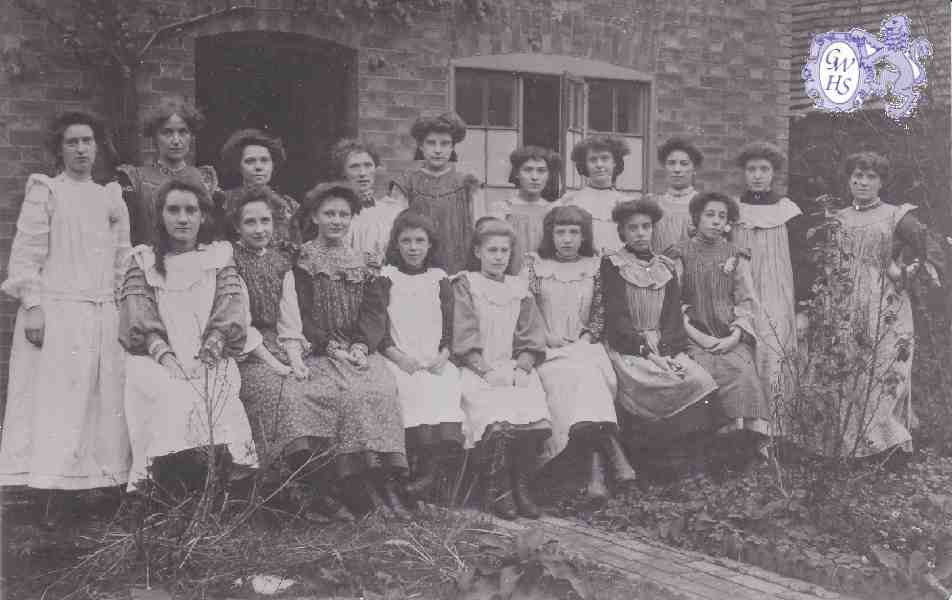 9-167 Cook & Hurst Factory Girls in front of house which stood where Co-op Hall is on Central Avenue Wigston Magna