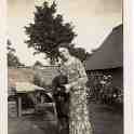 23-515 Harriet Hart with Dusky in the garden of The Queen's Head Bull Head Street Wigston Magna 1945