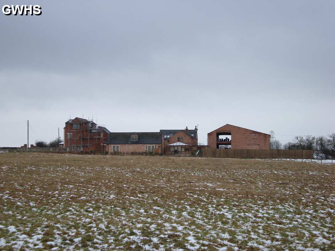 14-101 farm buildings and home between railway and canal near Kilby Bridge