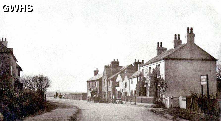 31-181 Ellis Farm on the left, next to the row of cottages Kilby Bridge