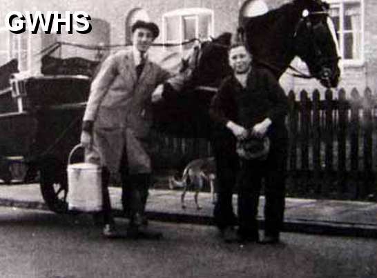 6-53b Eric Mason with Roger Pasks milk - outside '10 Row' Leicester Road Wigston Magna now Doris' Wool Shop copy