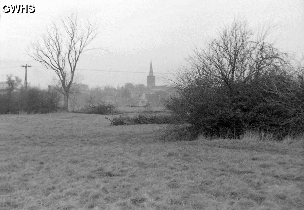 30-887 Looking across the fields towards All Saints Church before development of the Little Hill Est