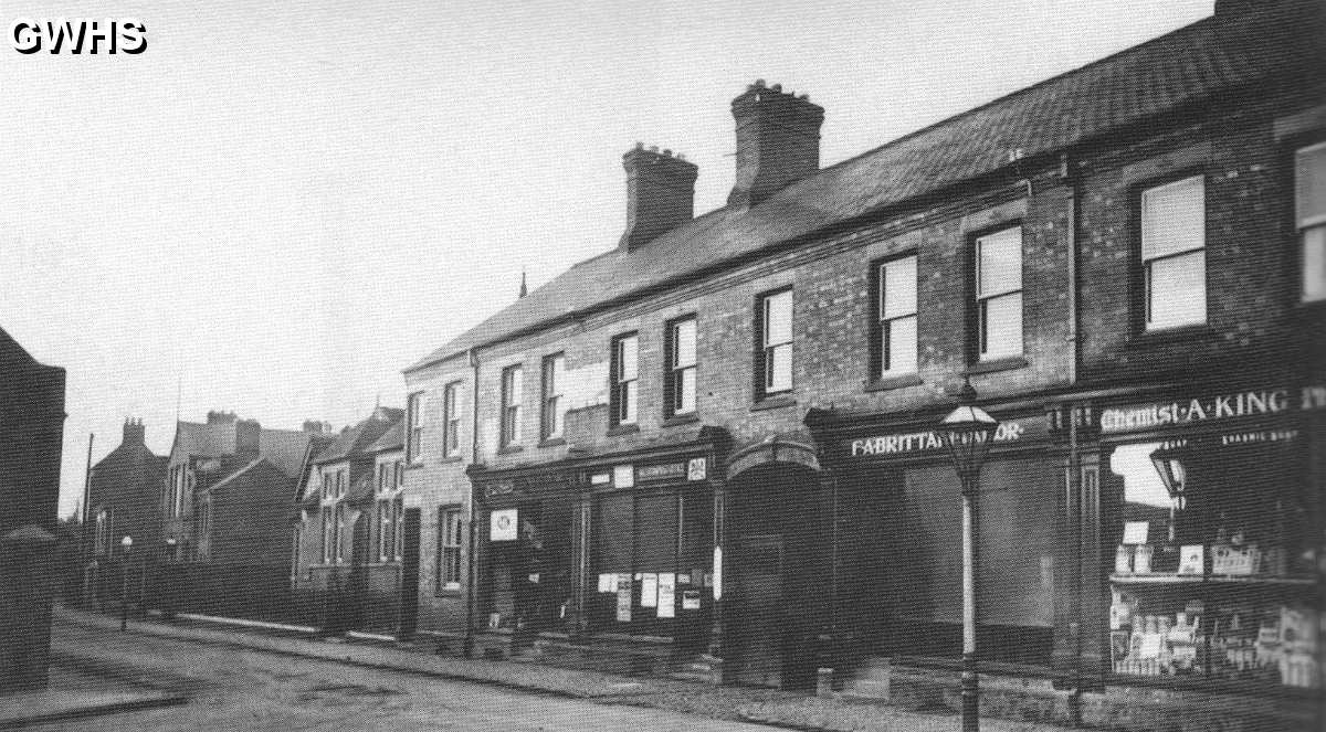 17-065a Businesses at the junjtion of Long Street and Bell Street Wigston Magna 1920's