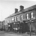 17-065 Businesses at the junjtion of Long Street and Bell Street Wigston Magna 1920's