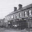 32-420 Four Businesses at the end of Long Street Wigston Magna c 1920