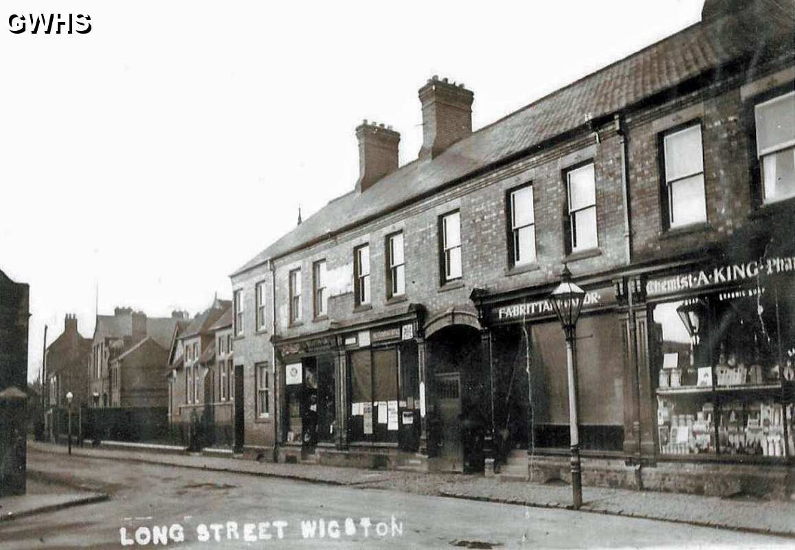 34-816 View looking into Long Street Wigston. c1920