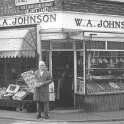 22-226 Brian Johnson outside his fruit and veg shop in Long Street  Wigston Magna.mid 1990's