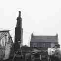 30-111 Jim painting a view of the boiler house and home at Horlocks Nurseries in 1964