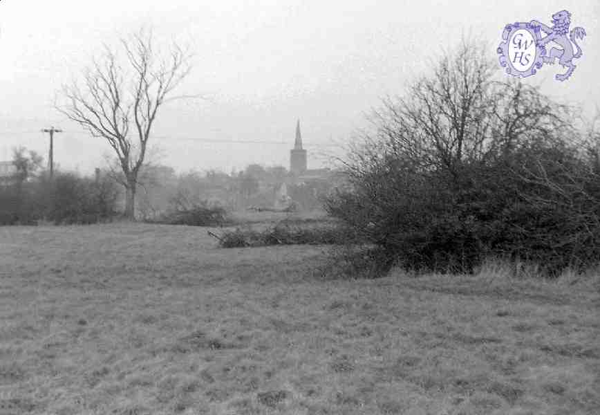 30-887 Looking across the fields towards All Saints Church before development of the Little Hill Est