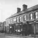 17-065a Businesses at the junjtion of Long Street and Bell Street Wigston Magna 1920's