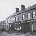 32-420 Four Businesses at the end of Long Street Wigston Magna c 1920