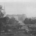 22-114 All Saints Church from the south with Yew Tree Farm in the foreground Wigston Magna 