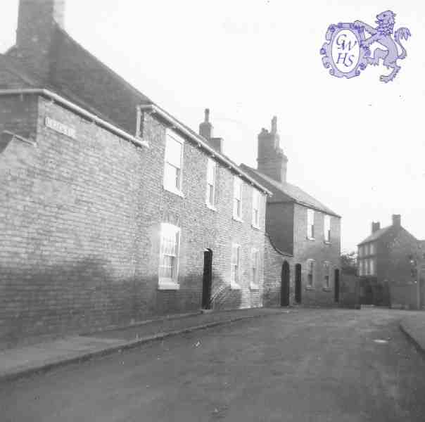 30-197a looking south down Newgate End Wigston Magna January 1966