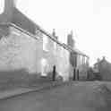 30-197a looking south down Newgate End Wigston Magna January 1966