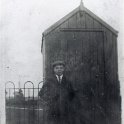 33-758 Walter Woodward outside a small hut either in the Park off Blaby Road or at the open air swimming baths near the canal next to Bush Lock 1928