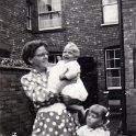 34-876 May Snutch holding Pauline and Valerie by her side at 31 Albion Street South Wigston