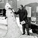 39-338 Milkman Ian Ellis could not resist offering a little of the milk of human kindness to the cold-hearted traffic policeman on Winslow Drive in Wigston, in January 1986