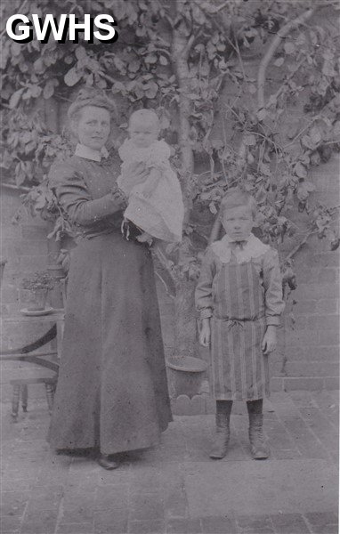 9-25 W H Bale - lad in apron butchers son South Wigston 1912