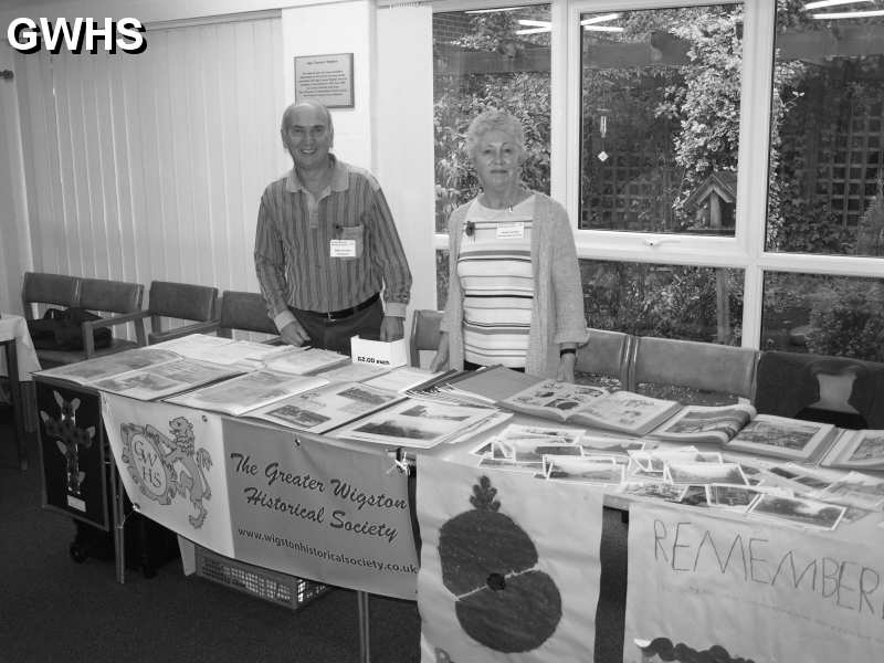 34-363 Mike & Linda Forryan manning table at AGE UK Exhibition in 2014