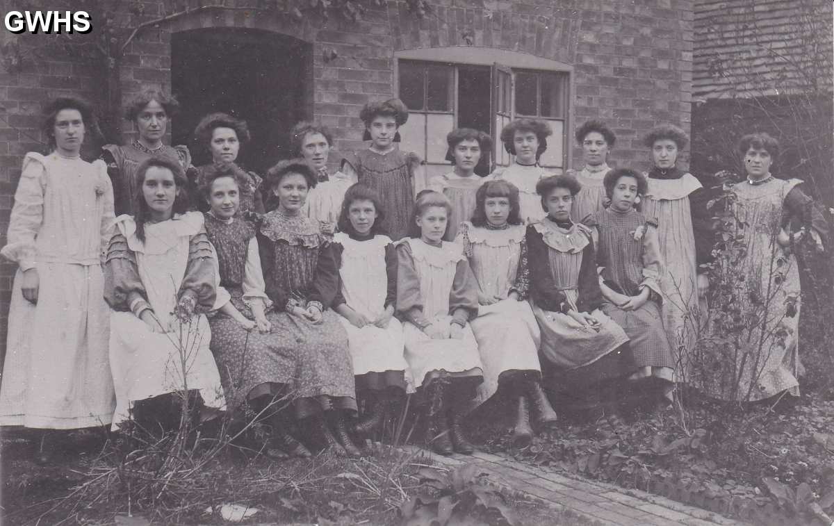 9-167 Cook & Hurst Factory Girls in front of house which stood where Co-op Hall is on Central Avenue Wigston Magna