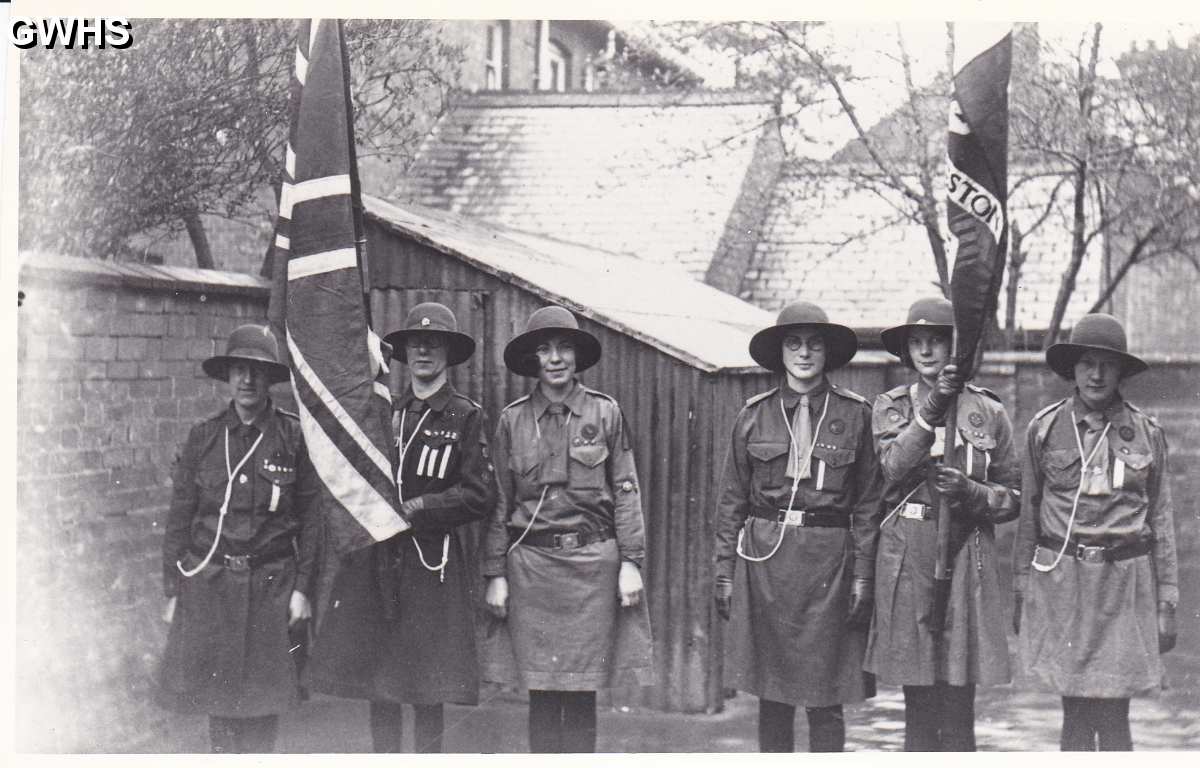 9-93 1st Wigston Guides holding flag 2nd May 1930