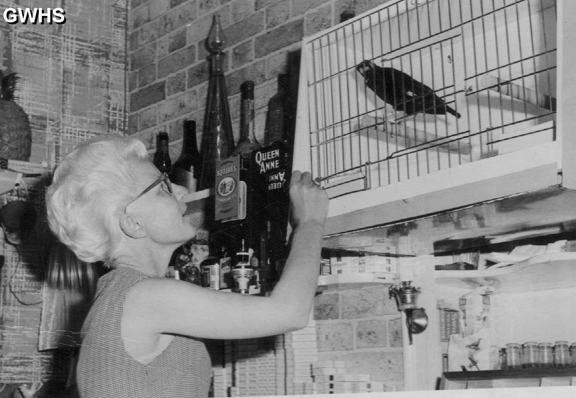 23-799 Mrs Penny Hallam in Penny's Bar at the Bulls Head Inn Bull Head Street Wigston Magna c 1964