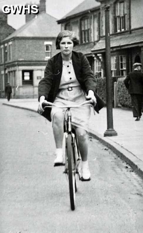 31-096 Ida Hampson now West cycling along Long Street near the Memorial Park circa 1939
