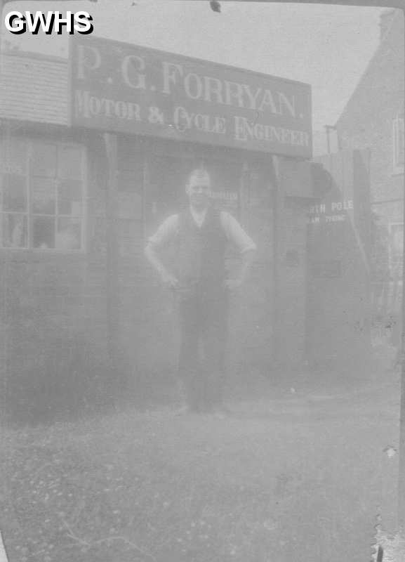 22-327 Percy George Forryan outside his garage Wigston Magna