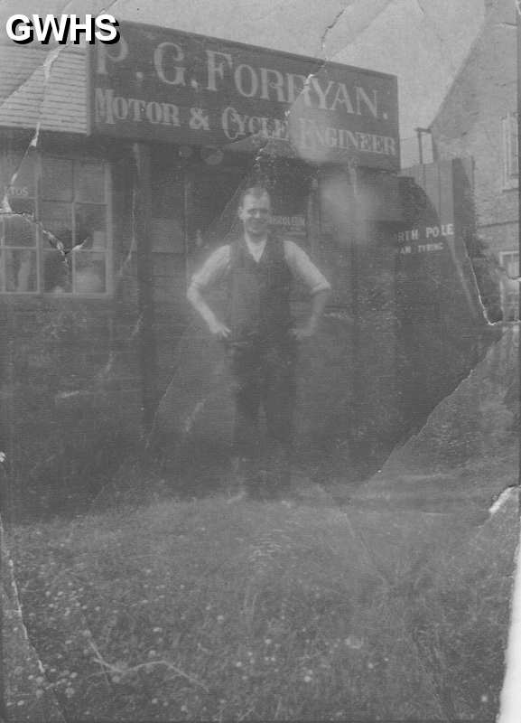 22-328 Percy George Forryan outside his garage Wigston Magna