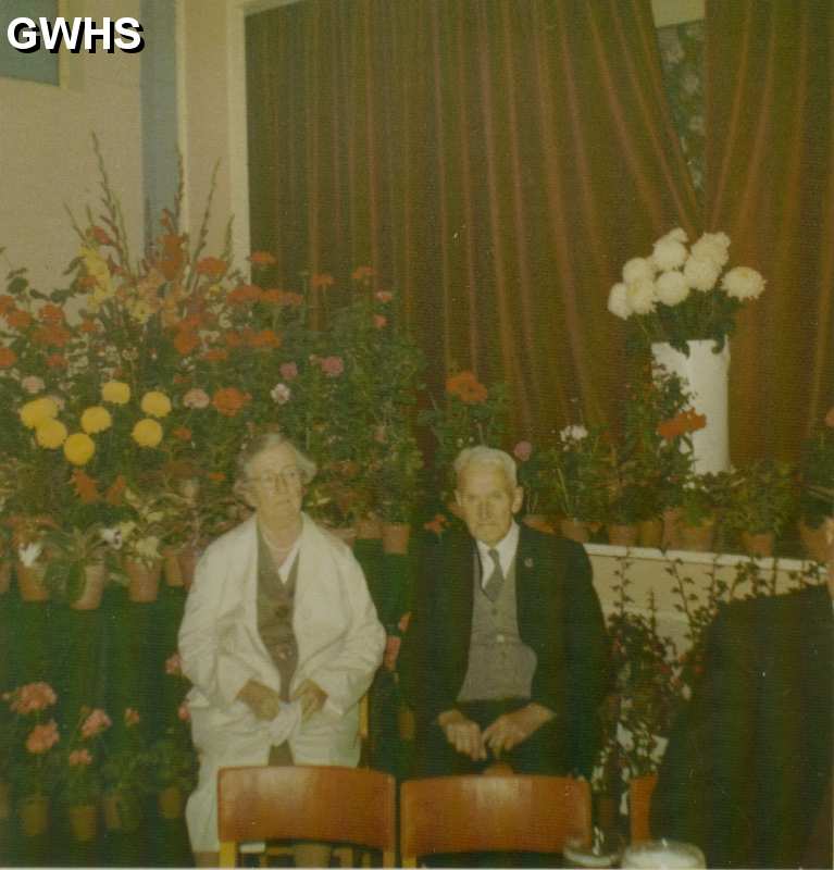 25-095 Annie and George Charles Russell sitting in the Great Wigston Working Men's Club on Long Street Wigston 